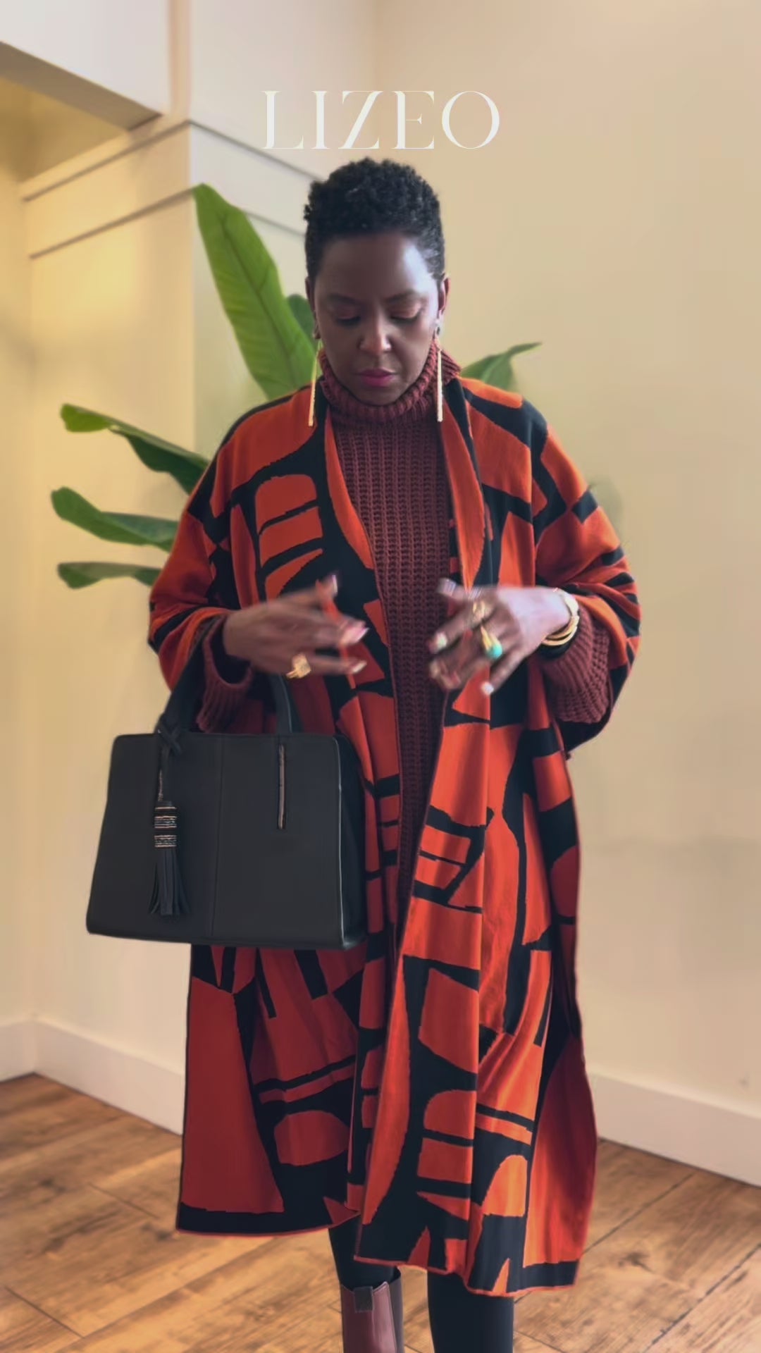 reversible-poncho-without-fringe-burnt-orange-video